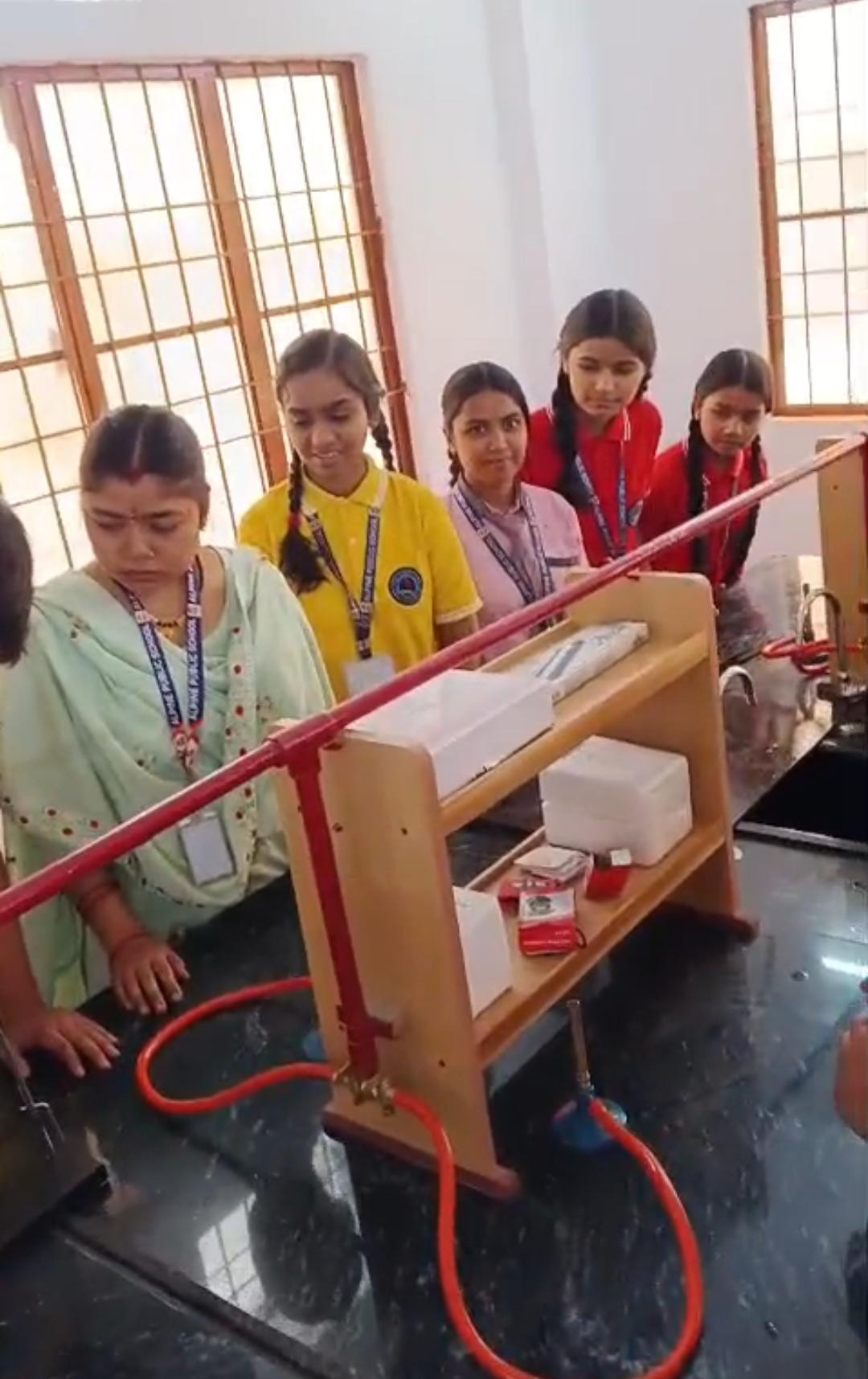 New Science Lab — Teacher Guiding Students